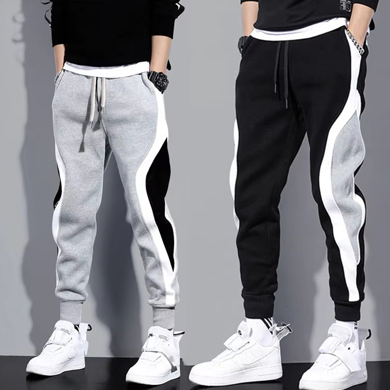 Pantalones anchos informales y sueltos para hombre, pantalones deportivos de retales de nueve puntos, cuerda elástica, transpirables, con lazo para los pies, otoño