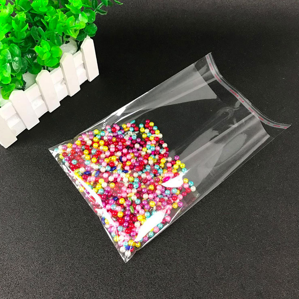 1000-100 Uds OPP bolsa de plástico transparente autoadhesiva bolsas de celofán transparentes autoselladas para joyería regalo galleta embalaje de dulces