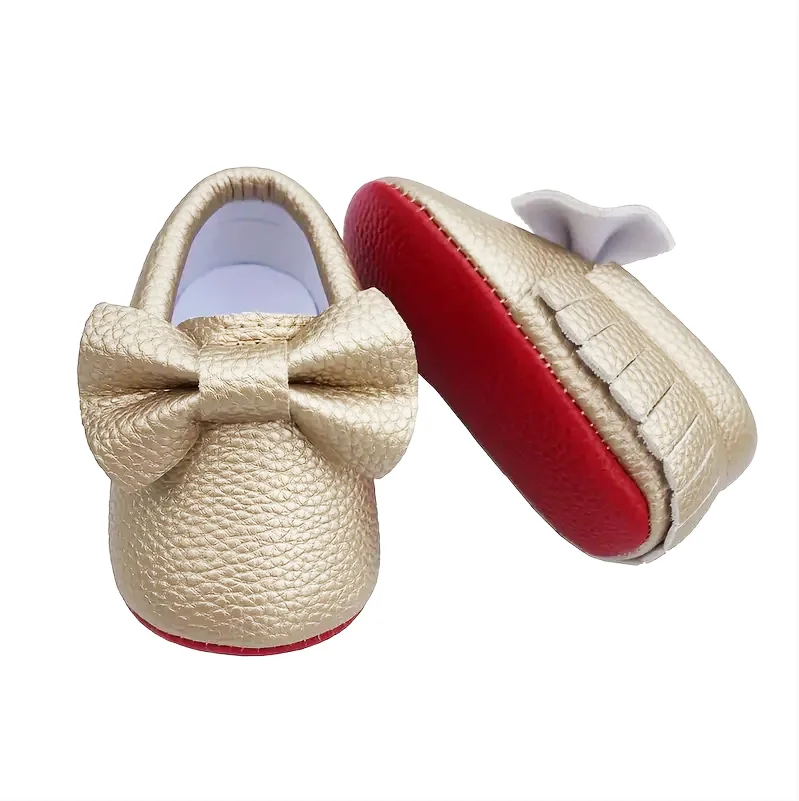 Bowknot หนังรองเท้าเด็กทารกแรกเกิดเด็กผู้หญิงรองเท้า Multicolor เด็กวัยหัดเดินสีแดง Soft Sole Anti-SLIP First Walkers ทารกแรกเกิด MOCCAS