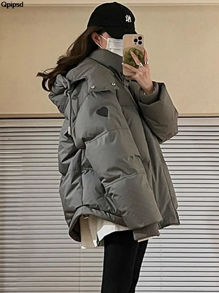 Casaco de inverno acolchoado feminino ao ar livre 2025 novo algodão com capuz sólido grosso parka impermeável inchado moda coreana