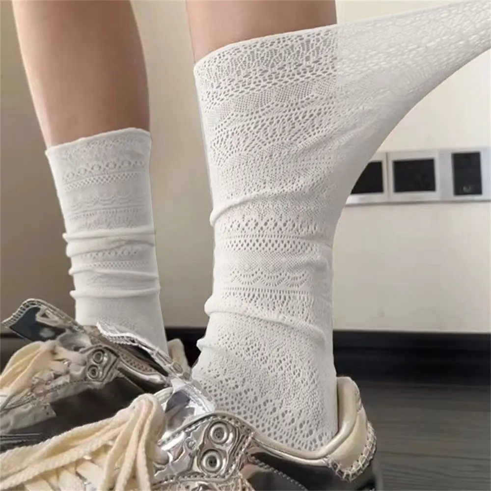 Calcetines de malla ahuecados de Lolita para mujer, medias transparentes de encaje fino, calcetines de seda Retro con flores
