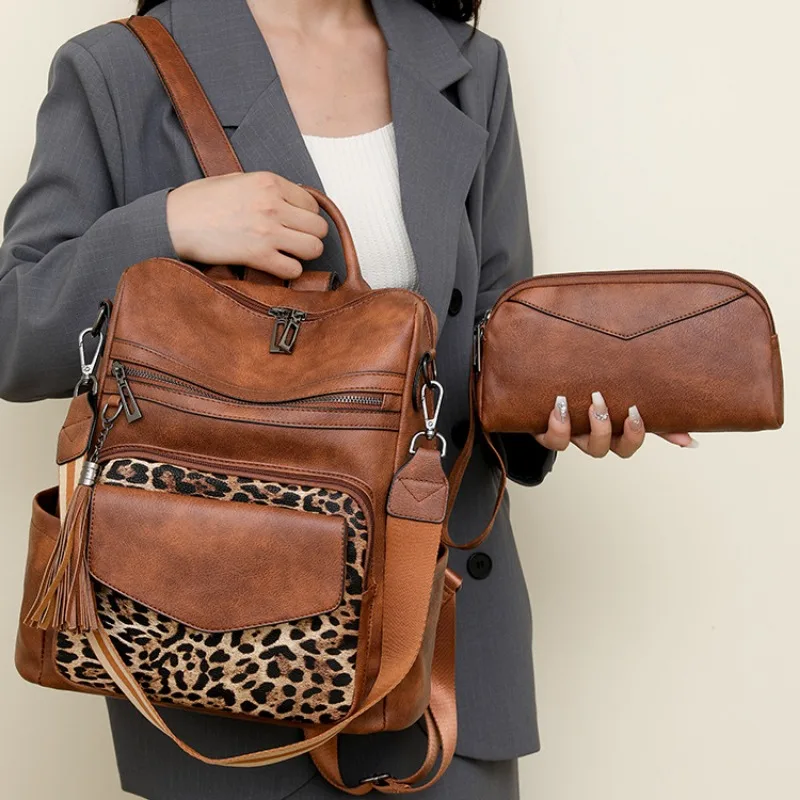 2025 nuevas mujeres de cuero impermeable antirrobo diseñador grande Retro mochila de viaje universitaria bolso de hombro cartera con borla Brow