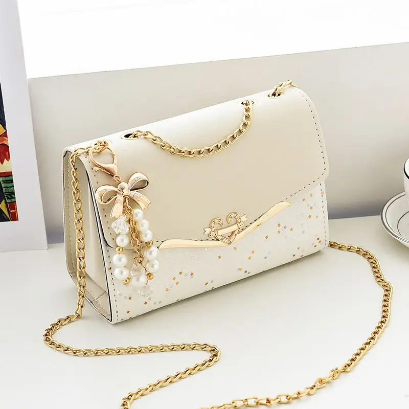 แฟชั่นอินเทรนด์สุภาพสตรีCrossbodyกระเป๋าสี่เหลี่ยมเล็กกระเป๋าสะพายไหล่Cross Squareพู่จี้เลื่อมประดับPUโพลีเอสเตอร์
