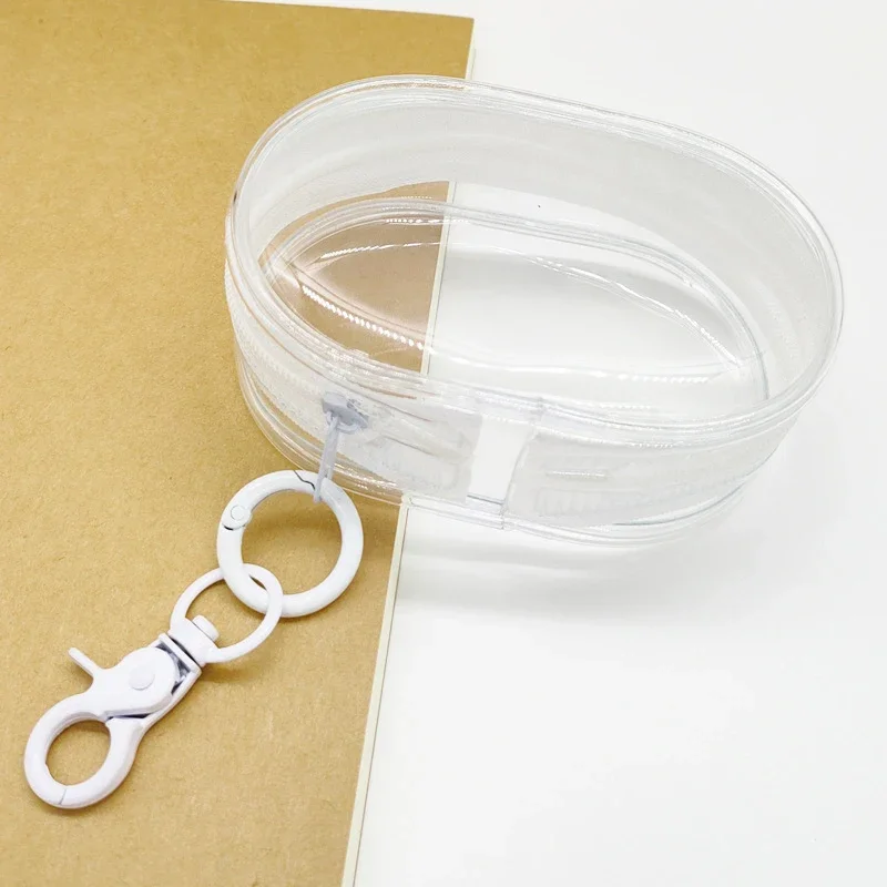 แบบพกพา Mini Clear Zipper กระเป๋าพวงกุญแจตุ๊กตาการ์ตูนของเล่นเด็ก Mystery Box สําหรับหูฟังเครื่องชาร์จของขวัญกระเป๋า