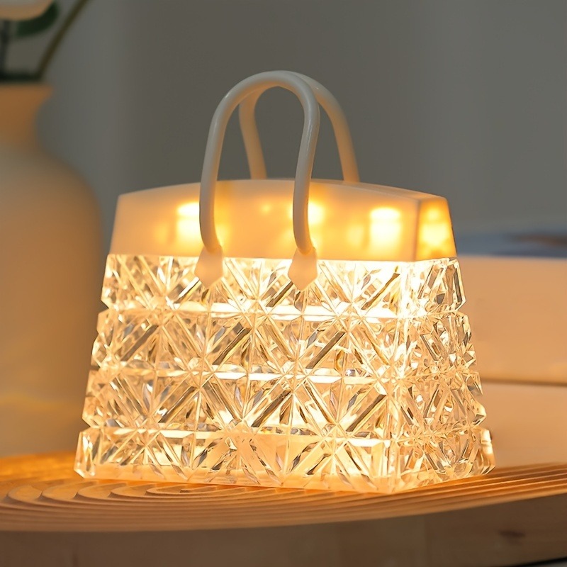 Luce notturna in acrilico ispirata alle borse chic: lampada d'ambiente moderna per camera da letto alimentata a batteria