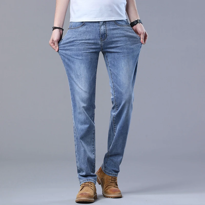 Pantalones vaqueros ajustados azul claro de primavera para hombre, pantalones vaqueros de tela elástica informales con estilo, pantalones clásicos gris humo