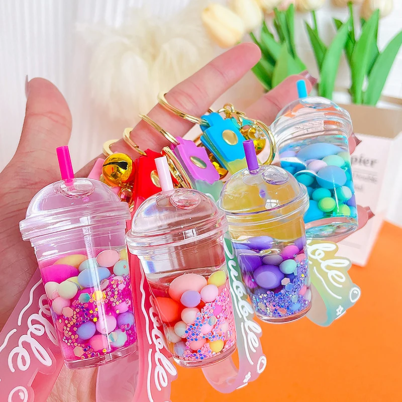Tasse à thé au lait avec perle liquide mignonne, clé d'astronome, porte-clés Creative Quicksand, pendentif de sac à dos, cadeau porte-clés, MSI flottante, JOCreative
