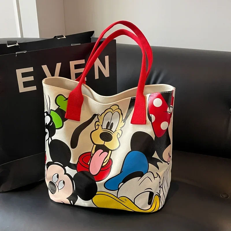 Bolso de lona de gran capacidad con dibujos de Mickey Mouse de Disney, bolso de mano bonito para mujer, bolso escolar para estudiante, bolso de Minnie