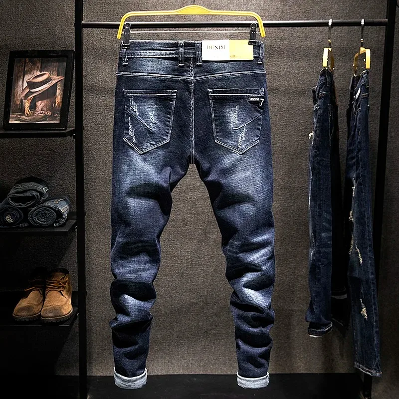 Pantalones vaqueros rectos elásticos americanos para hombre, pantalones vaqueros de algodón ajustados desgastados rasgados, moda de estilo coreano, ropa azul y negra para hombre