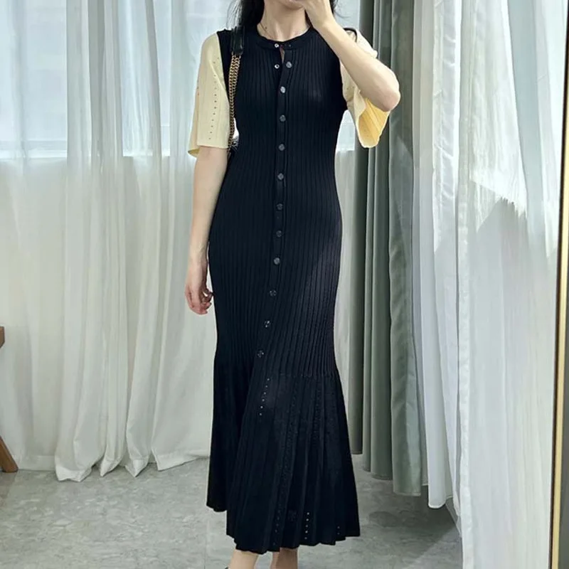 Abito lavorato a maglia a maniche corte a trapezio francese traforato alla moda in stile estivo, abito lungo a coda di pesce per donna