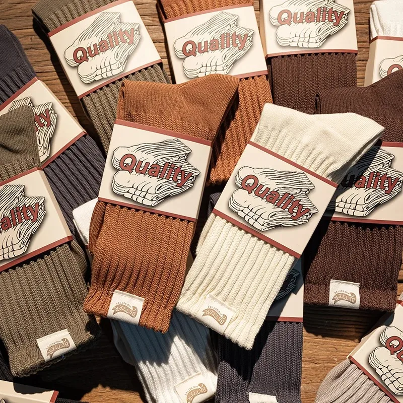 Calcetines de algodón de Color sólido de cilindro medio de línea gruesa para hombres y mujeres Otoño Invierno medias de aguja gruesas Vintage