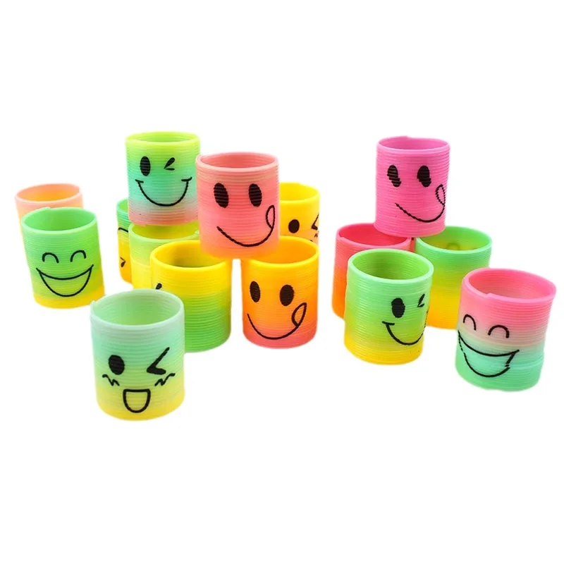 12個/セット レインボー スタッキング ミュージック ノスタルジック パズル プラスチック製 小さなギフト スプリング サークルマジック レインボーサークル 男の子 女の子向けギフト