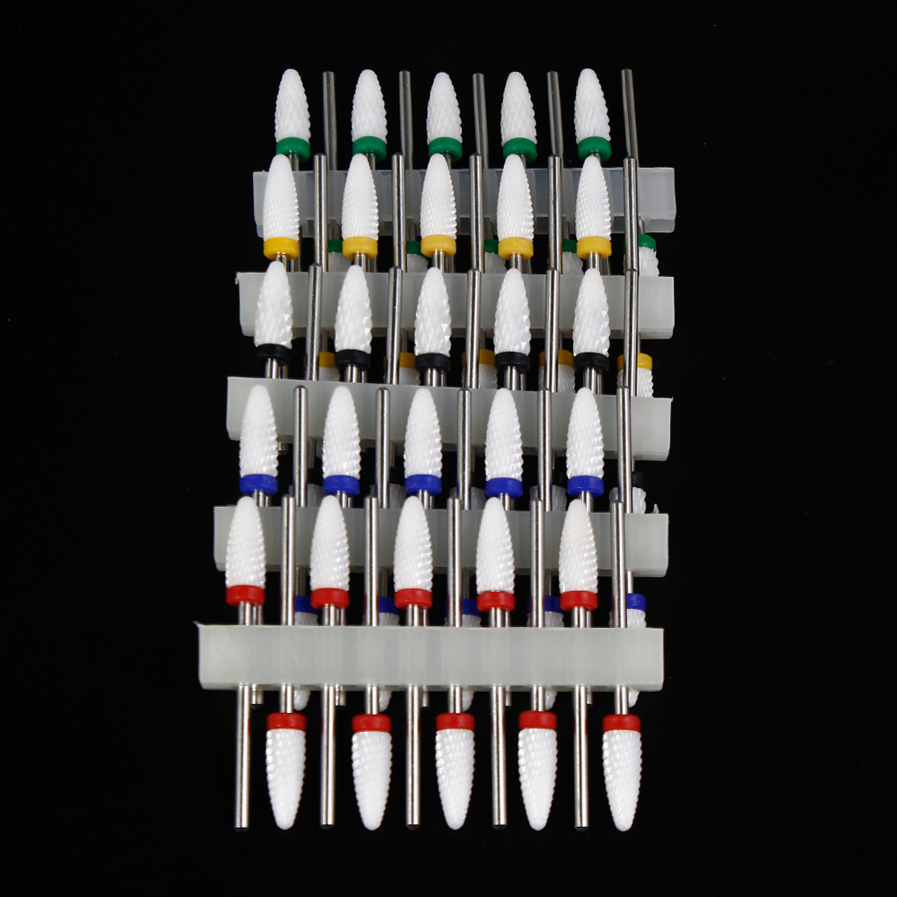 10 個セラミックネイルドリルビットセットフライスカッター電気マニキュアビット炎トウモロコシファイルペディキュアマシンポリッシュ Accesoires