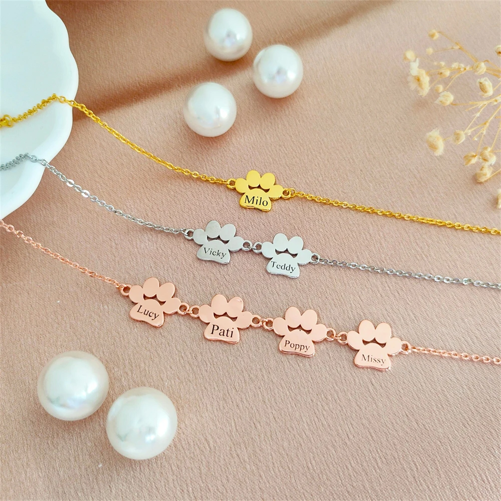 CUSTOM Dog PAW พิมพ์สร้อยข้อมือสแตนเลสส่วนบุคคลสัตว์เลี้ยงเครื่องประดับแกะสลักหลายชื่อสร้อยข้อมือของขวัญสําหรับสตรี