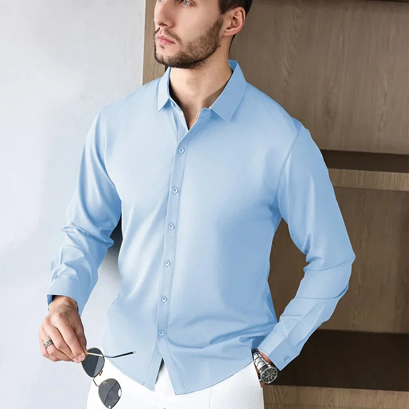 Nueva camisa informal de negocios de manga larga de Color sólido para hombre, resistente a las arrugas, cómoda, versátil para todas las estaciones