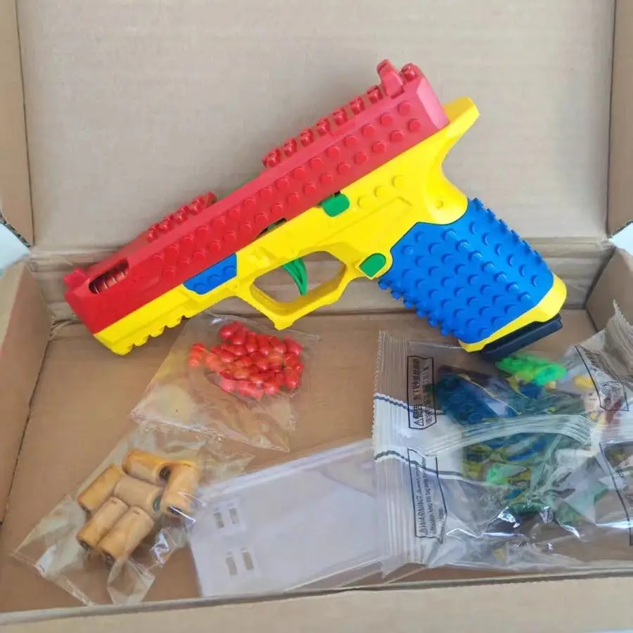 Pistola de bloques de construcción, pistola de juguete de disparo continuo, lanzamiento de carcasa, Airsoft, Blowback, colgante vacío, arma CS para exteriores para niños y adultos