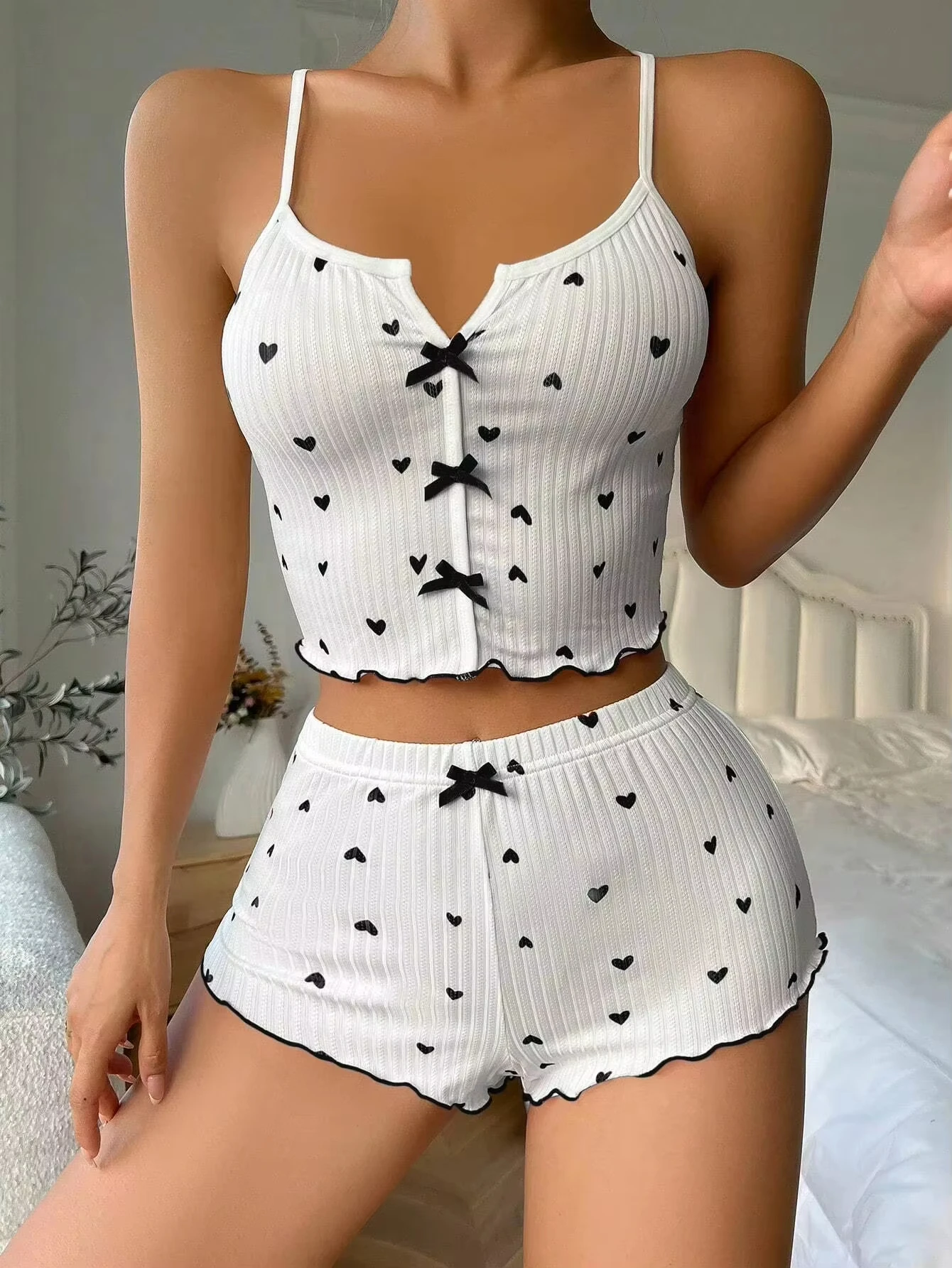 Conjunto de pijama con estampado de corazón para mujer, ropa de dormir acanalada con detalle de lazo, pantalones cortos, ropa de descanso suave y cómoda, nueva moda