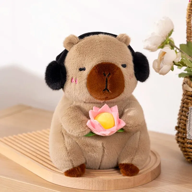 1 ชิ้นใหม่น่ารัก Capybara ตุ๊กตาของเล่นตุ๊กตาสัตว์ Capybara ตุ๊กตานุ่มถือดอกไม้ของเล่นเด็กของขวัญวันเกิด