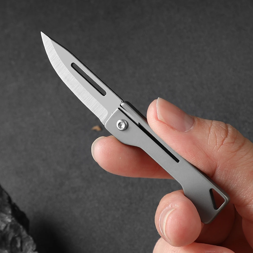 Coltello da tasca mini coltello pieghevole in titanio EDC coltello da tasca sottile coltello da tasca per donna Coltelli da frutta