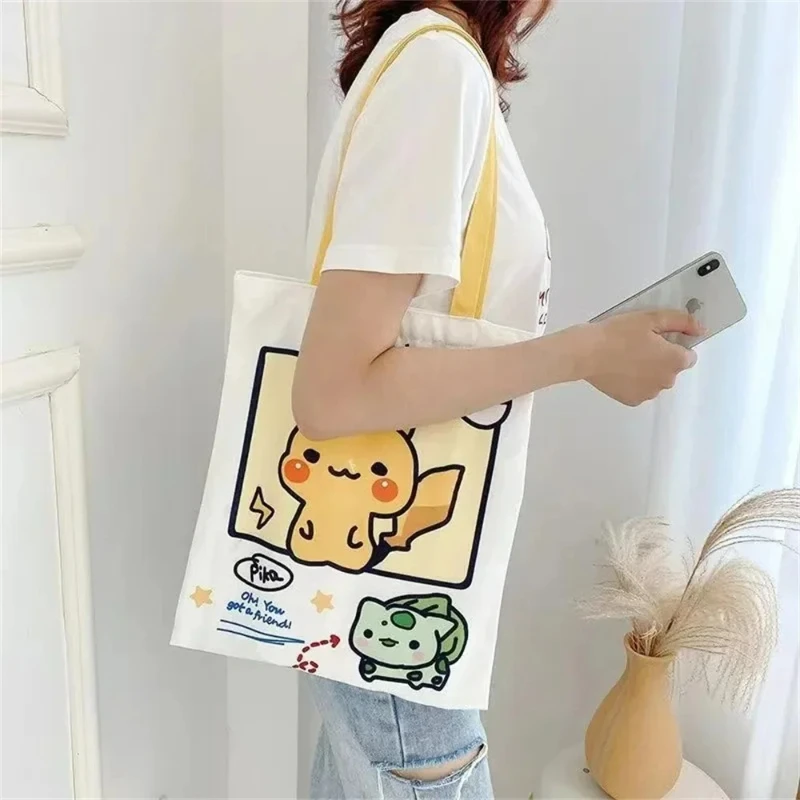 Torba na ramię z płótna o dużej pojemności z motywem anime Pokemon Pikachu, Psyduck, Squirtle, damska torba codzienna, torba na zakupy wielokrotnego użytku.