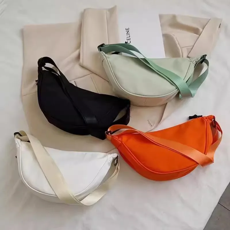 แฟชั่นผู้หญิงไหล่กระเป๋าไนลอนสีทึบ Dumpling Messenger กระเป๋า 2024 ใหม่อินเทรนด์น้ําหนักเบาขนาดใหญ่ความจุ Underarm Bag