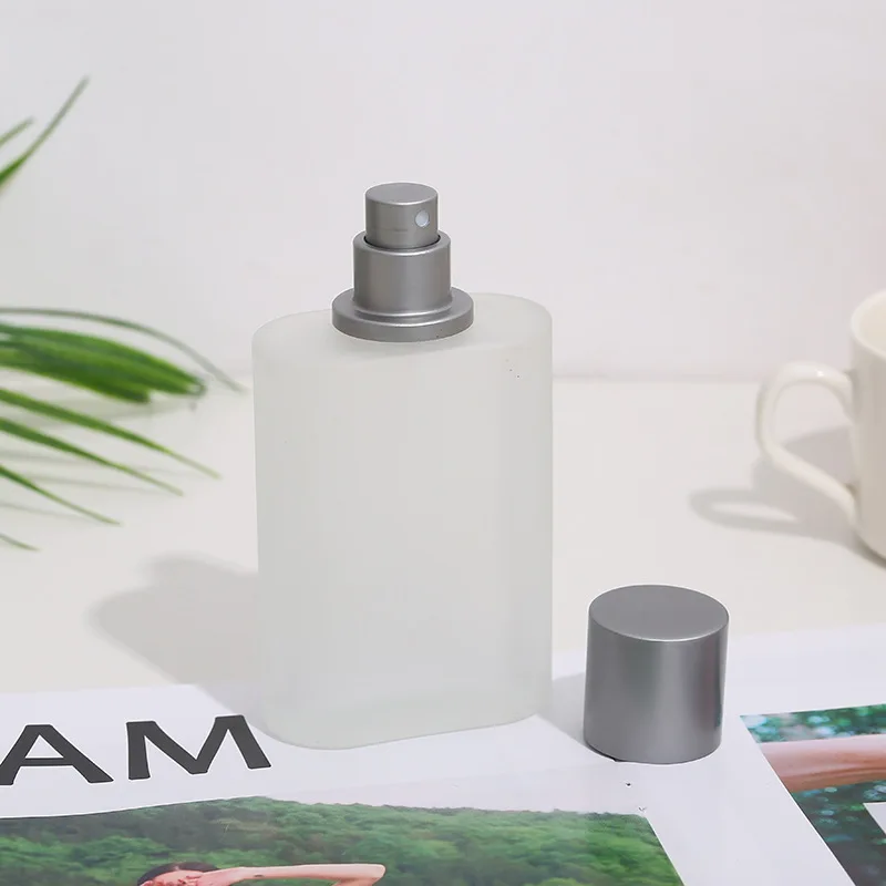 Botella de Perfume de vidrio arenado con tapa de tornillo de 30ml, botella vacía con pulverizador líquido, botella dispensadora de 50ml, maquillaje vacío, niebla fina