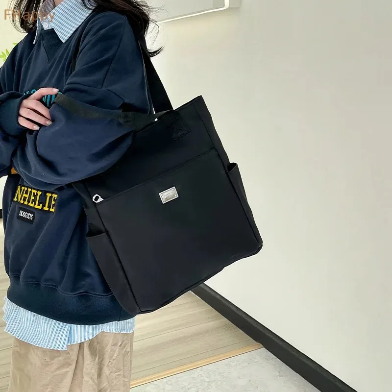 軽量で防水性のあるショルダーバッグ、仕事、勉強、旅行に適した大容量のハンドバッグ