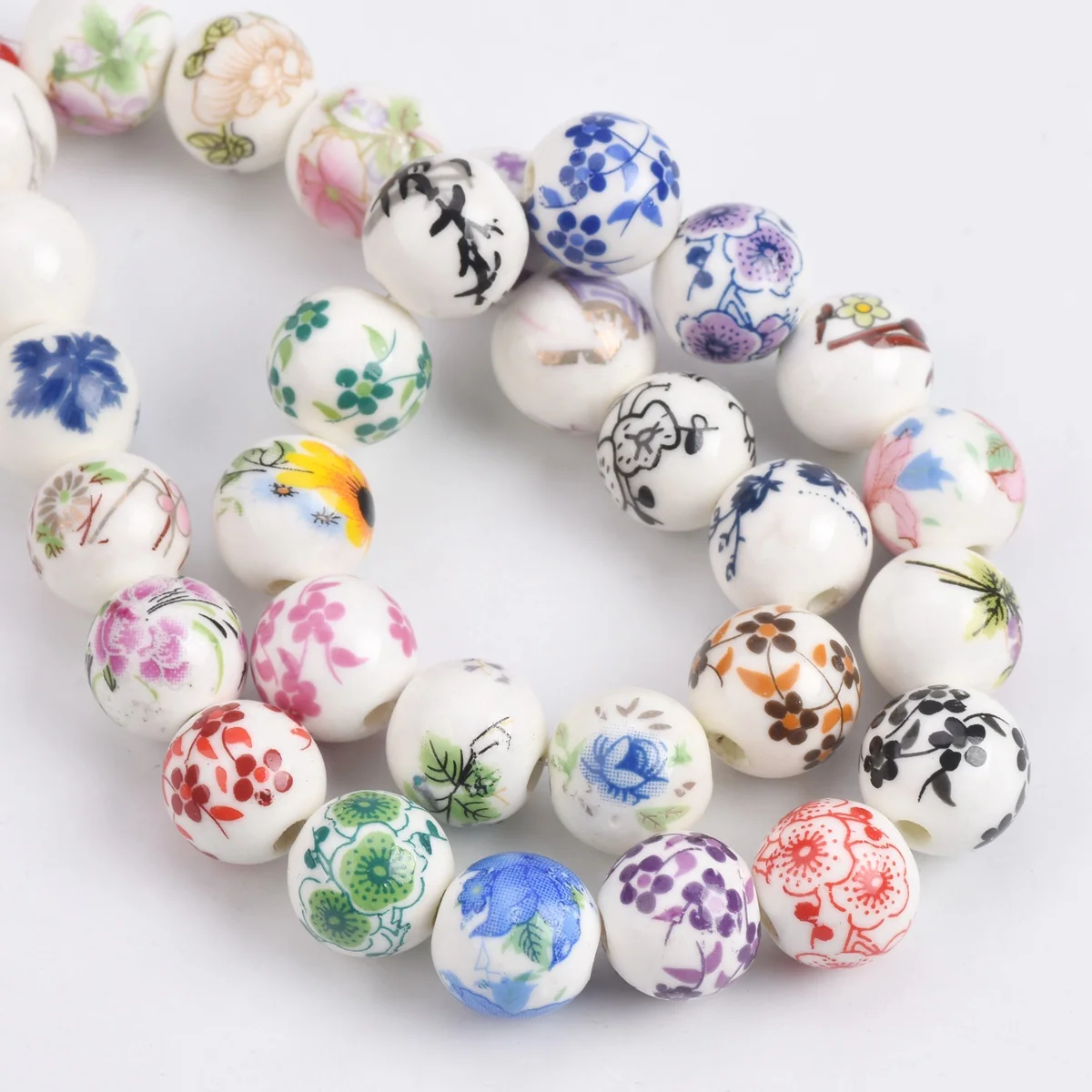 10 個 10 ミリメートル 12 ミリメートル花柄ラウンドセラミック磁器ルーススペーサービーズ DIY 工芸品ブレスレットジュエリーメイキング 1 # ~44 #