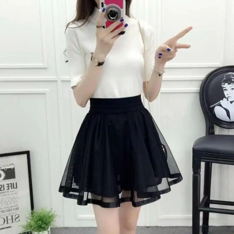Estate nuova gonna elastica A vita alta donna tutto-fiammifero una linea Shaggy gonna corta maglia nera pizzo pieghettato colore puro giovane moda