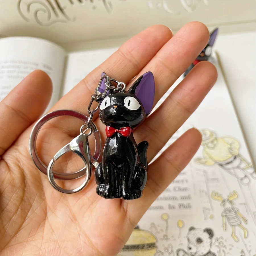 魅力的な黒猫キーホルダー - かわいいPVC製レディースファッションアクセサリー、バッグや鍵に最適、猫アクセサリー