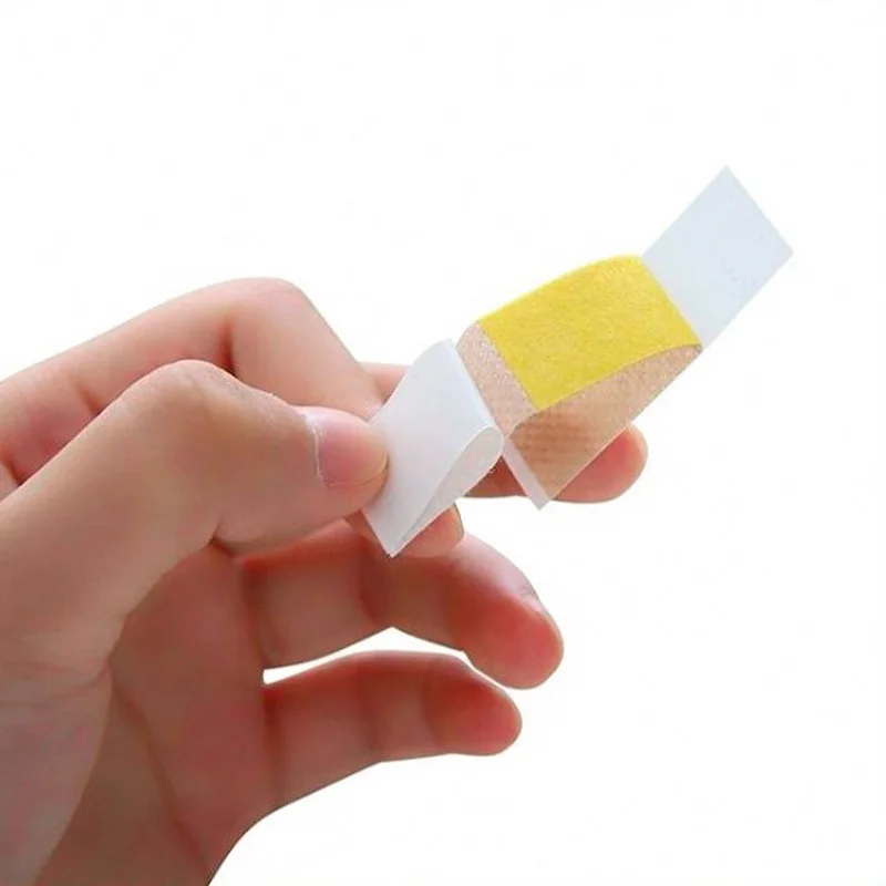 50pcs กันน้ํา First Aid Woundplast Breathable ผ้าพันแผลกาวทางการแพทย์เทปผ่าตัดบาดแผล Band Aid Sticking Plaster