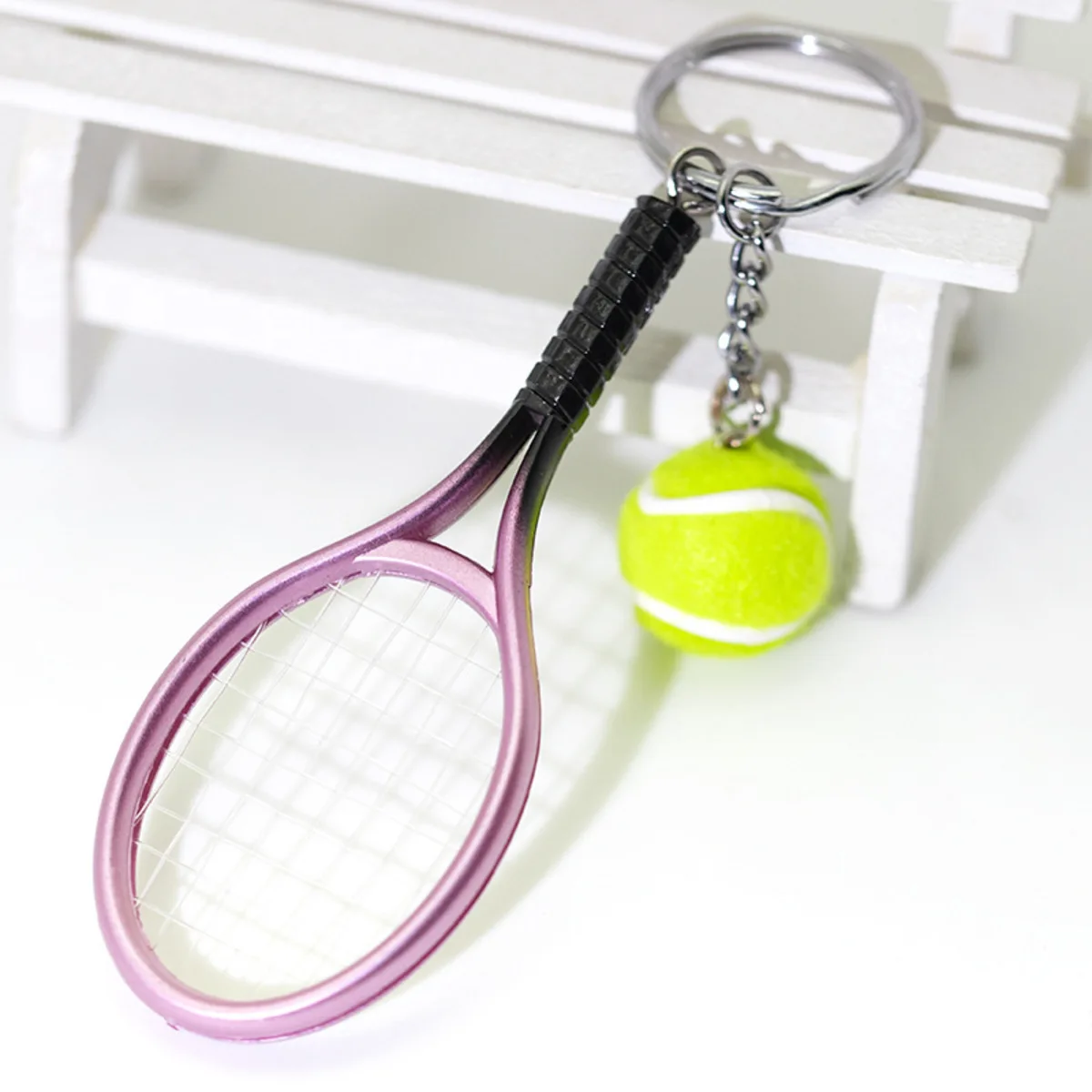 Tennisracket sleutelhanger cadeau - miniatuur realistische sport sleutelhanger, ideaal souvenir voor coaches en spelers, klein maar betekenisvol