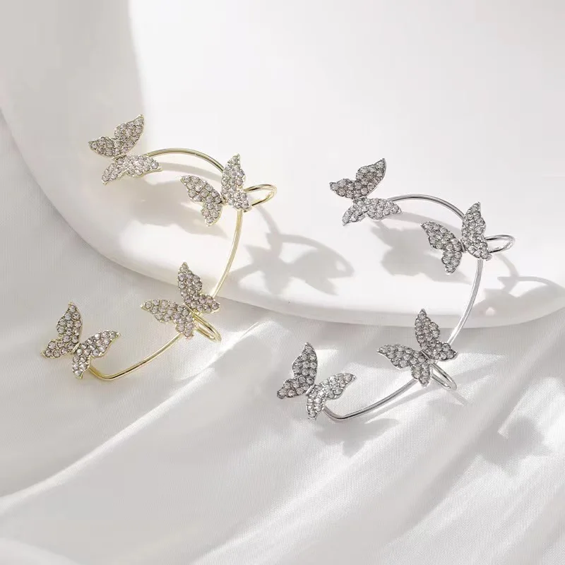 Design hohle Schmetterling Ohrringe Mode exquisite Einzel ohr haken Frauen Mädchen Metall Strass Ohr manschette Kristall Schmuck Geschenk