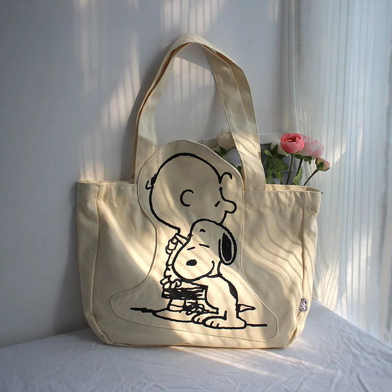 Nuova borsa a tracolla in tela Snoopy moda cartone animato Borsa a tracolla per lezione studentessa carina casual di grande capacità