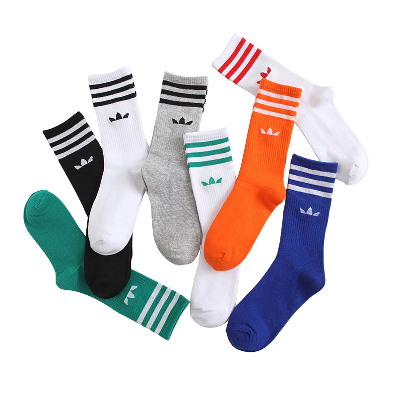 Calcetines deportivos puros a la moda de tubo de alto Color, calcetines de algodón con trébol para hombres y mujeres, calcetines Ins salvajes, calcetines a rayas, novedad de 2024