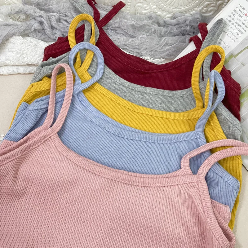 Nova camisola pequena de cor sólida de verão para meninas e estudantes, com um visual emagrecedor e um colete de linha versátil. Camisa de base curta