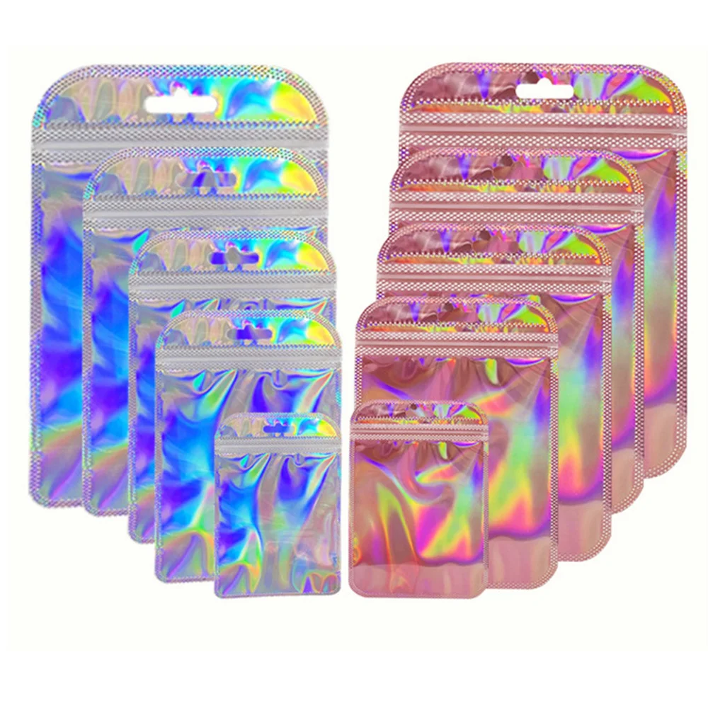 50 Uds 100 Uds bolsas Ziplock láser rosa bolsas transparentes de plástico reutilizables para embalaje de joyería bolsas de exhibición de cosméticos al por menor
