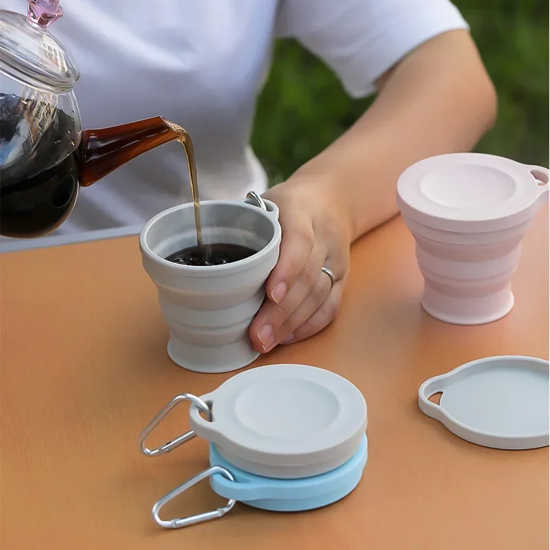 Tazza pieghevole in silicone per esterni con foro per appendere Tazza per acqua creativa Tazza per lavaggio portatile da viaggio Tazza in silicone da viaggio alla moda