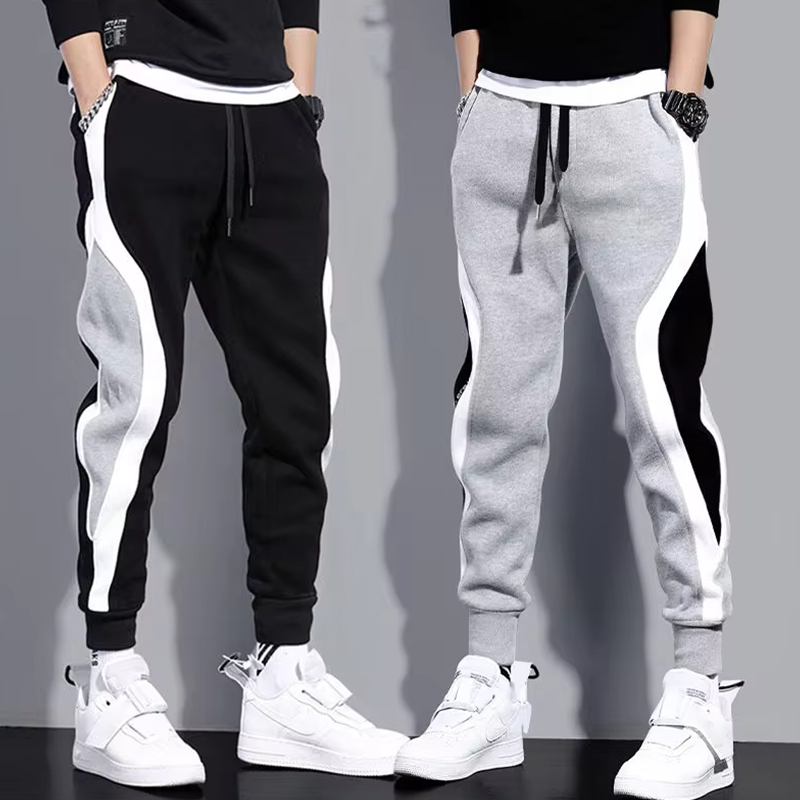 Pantalones anchos informales y sueltos para hombre, pantalones deportivos de retales de nueve puntos, cuerda elástica, transpirables, con lazo para los pies, otoño