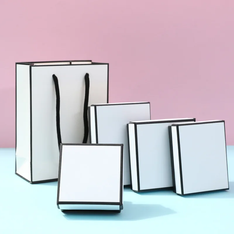 12 แพ็คสีขาวสีดํากระดาษแข็งกล่องเครื่องประดับต่างหูแหวนสร้อยคอกล่อง 7x9x3 ซม.กระดาษคราฟท์งานแต่งงานของขวัญฝุ่นกรณี