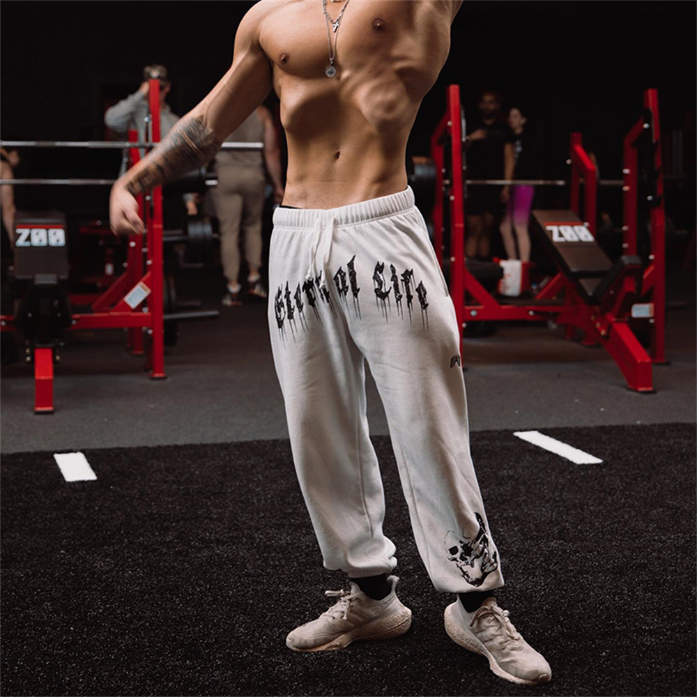 ฤดูใบไม้ร่วงฤดูใบไม้ผลิใหม่ยี่ห้อ Mens Gym Joggers กางเกงผ้าฝ้าย Streetwear Sweatpants กีฬากางเกงขายาวกางเกงฟิตเนสเพาะกายกางเกง