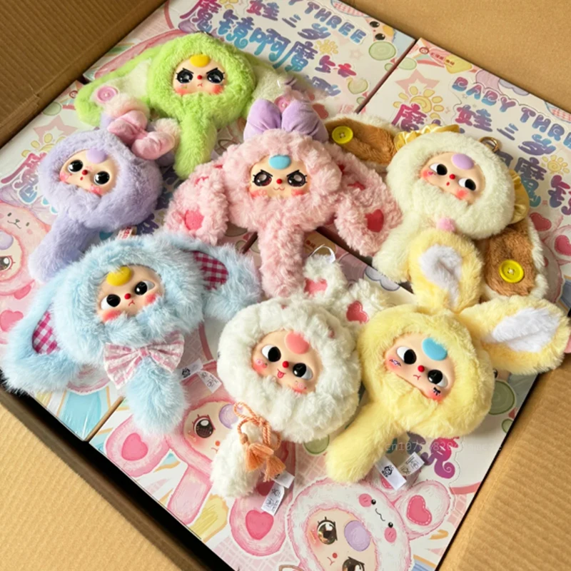 Caliente bebé tres muñecas serie de espejos mágicos caja ciega Kawaii genuina bolsa ciega estatuilla de mano adorno de escritorio juguetes de regalo de Navidad