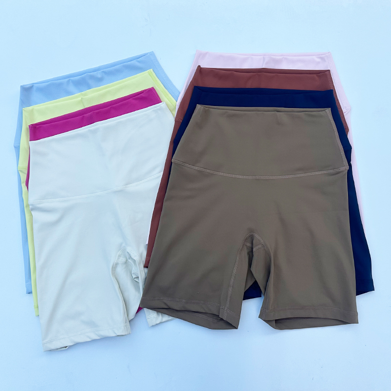 Pantalones cortos deportivos para mujer, pantalones cortos de Yoga de cintura alta, ajustados, levantadores de glúteos, gimnasio, correr, pantalones cortos de nailon de alta elasticidad