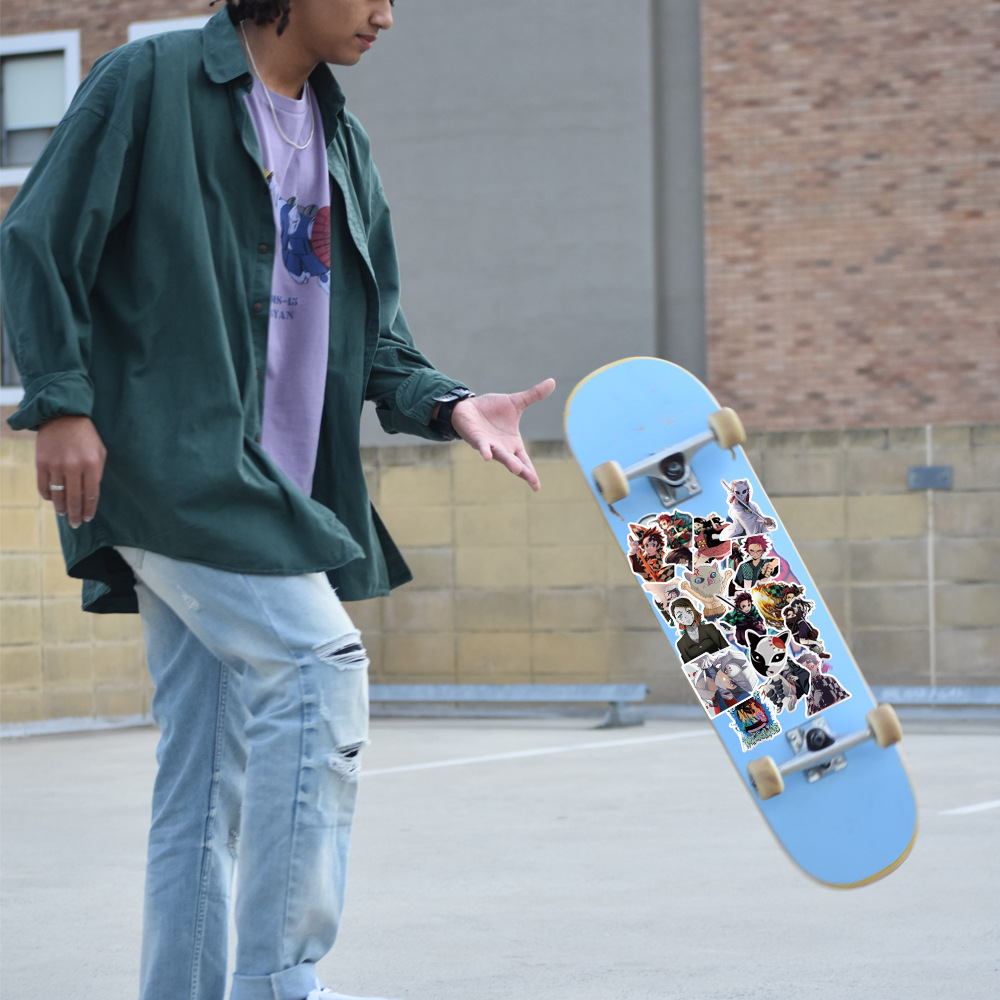 100/200 pçs dos desenhos animados anime demon slayer adesivos para portátil mala skate guitarra telefone dos desenhos animados adesivo presente do miúdo brinquedos