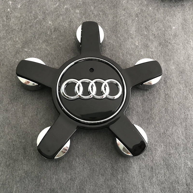 4PCS รถห้ากรงเล็บศูนย์ล้อ HUB ครอบคลุมอัตโนมัติสัญลักษณ์อุปกรณ์ตกแต่งสําหรับ AUDI A4 B8 B6 B9 b7 A3 8P 8V 8L A6 C7 C6