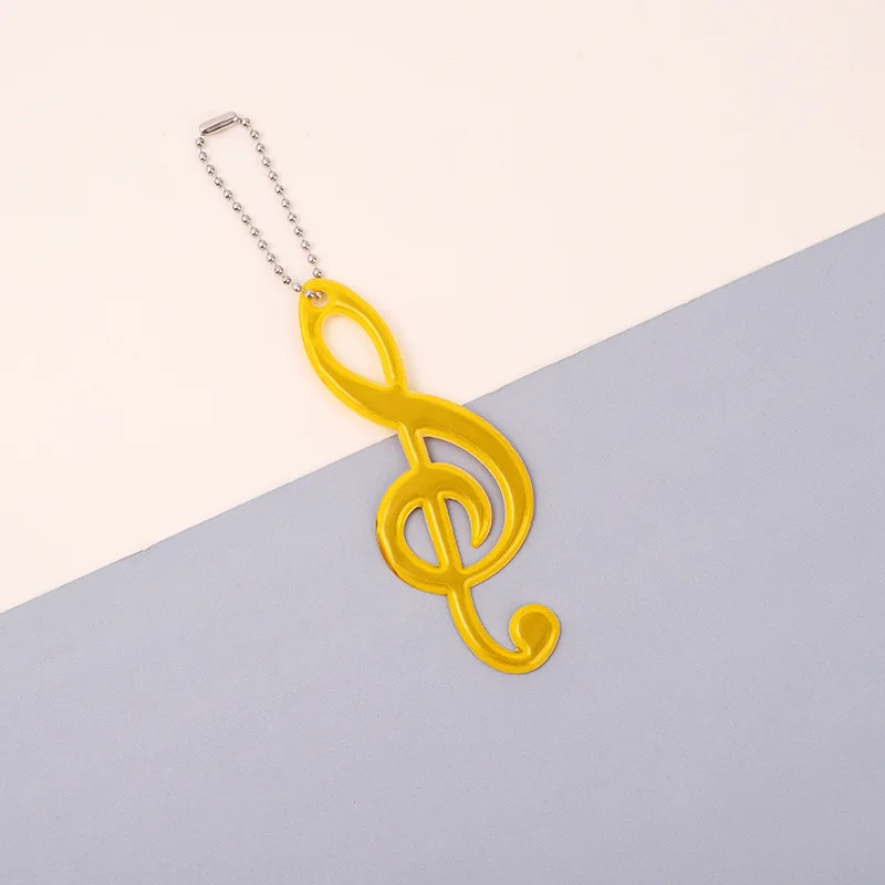 2Pcs Color Music Note PVC Reflective Pendant Kids Schoolbag Keychain Charm Night Running Cycling Luminous Warning Tag in Dark