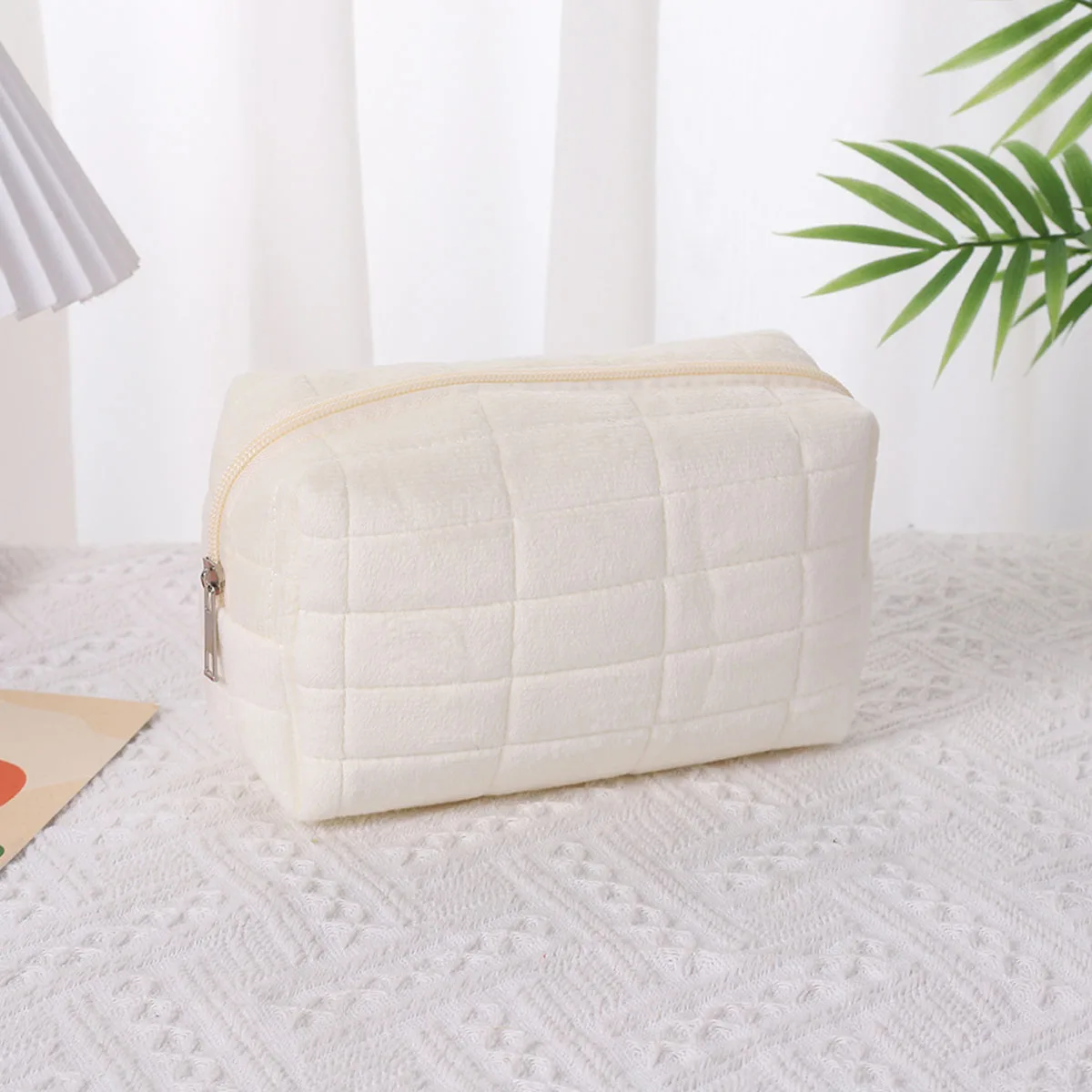 Bolsa de maquillaje, almacenamiento de almohadas, sentido de alta gama, bolsa de almacenamiento de gran capacidad