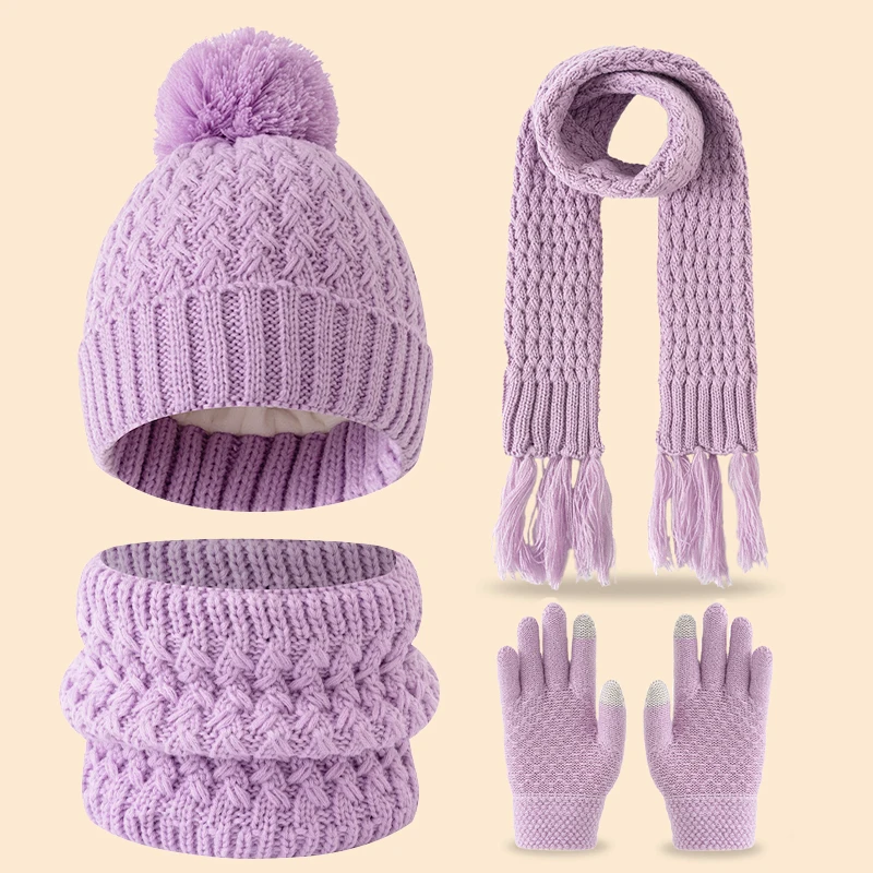 Un simpatico pile invernale a una sola palla e un set addensato di sciarpe, cappelli e guanti con nappe per bambini di 3-14 anni