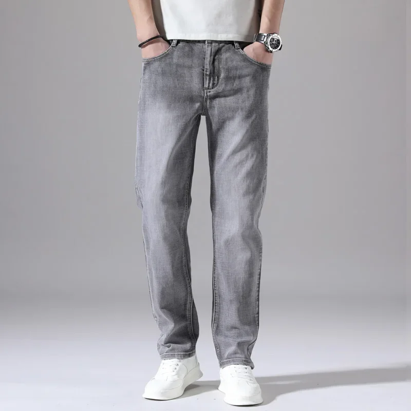 Pantalones vaqueros elásticos de algodón para hombre, Vaqueros de mezclilla finos informales de negocios, color gris, primavera y verano, nuevo ajuste recto y ligero