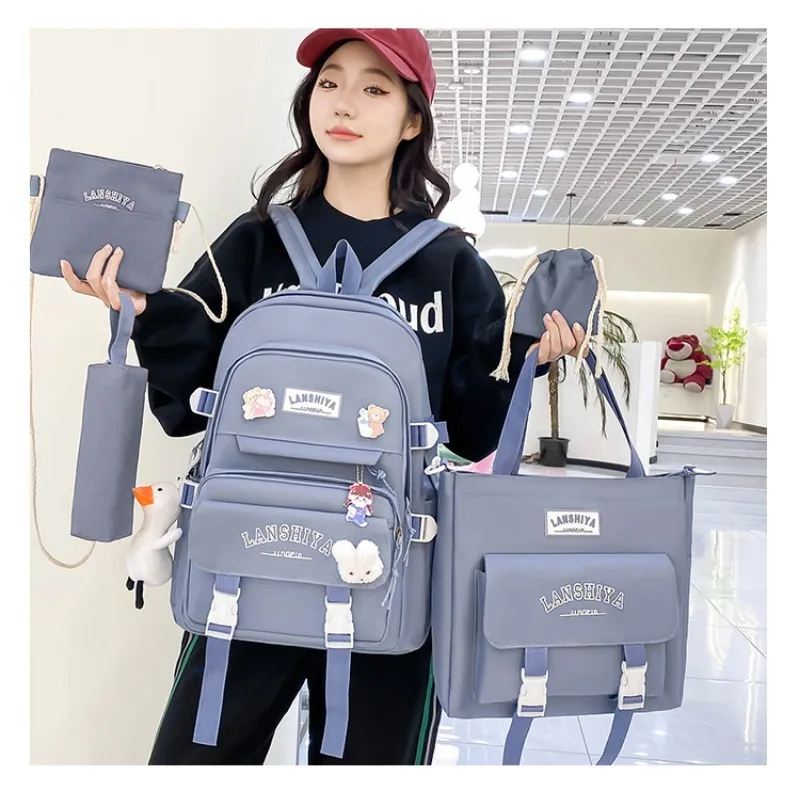 ชุดจี้ฟรี 5 ชิ้นสไตล์ป่าเวอร์ชั่นเกาหลีลําลองฮาราจูกุกระเป๋าเป้สะพายหลังนักเรียนสําหรับสาวโรงเรียนมัธยมความจุขนาดใหญ่